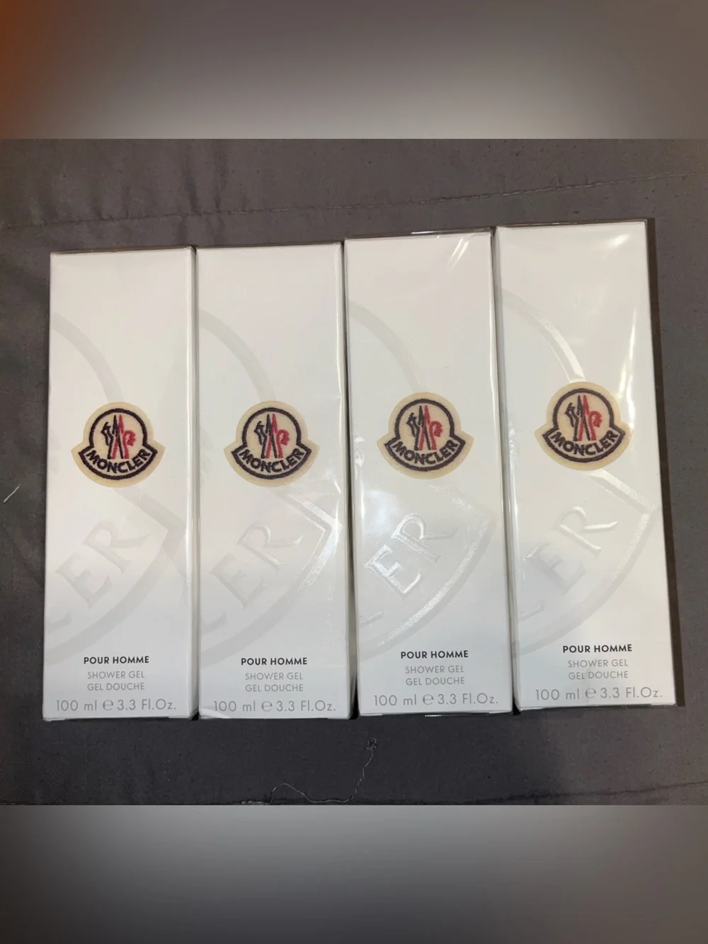 Moncler Pour Homme Fragrance 4 piece shower gel- White and Red Accents
